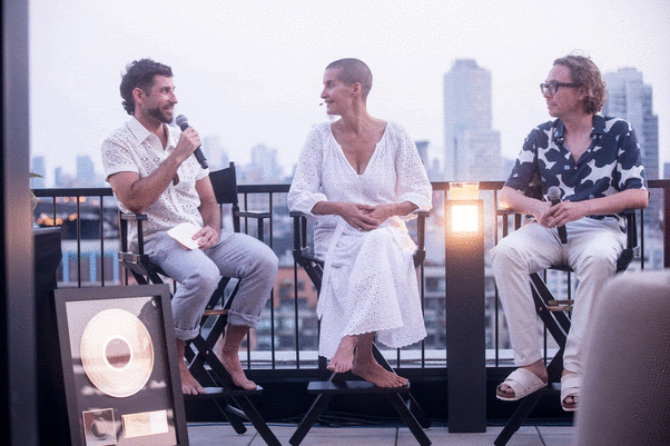 John Farrey (Dance & Electronic Lead for Amazon Music) leads a Q&A with Paavo Siljamäki of Above & Beyond and Elena Brower, following a rooftop yoga session on July 5 in NYC. Photo by Jamie Rosenberg.